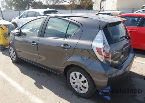 2014 Toyota Prius C Two z USA, uszkodzony, nr VIN JTDKDTB32E1570217